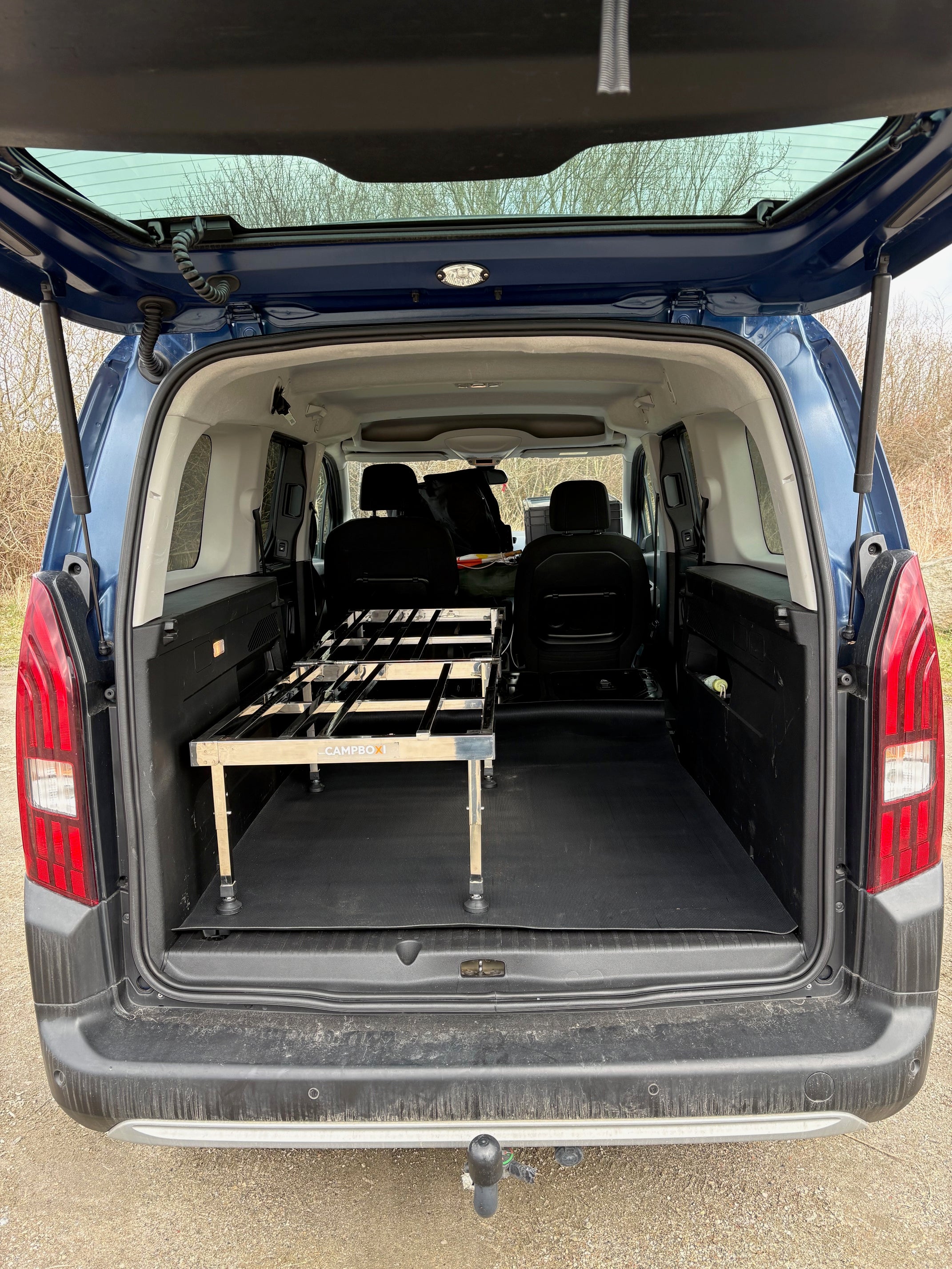 CampBoxi Unifit - Flexible and adjustable bed frame for your everyday car