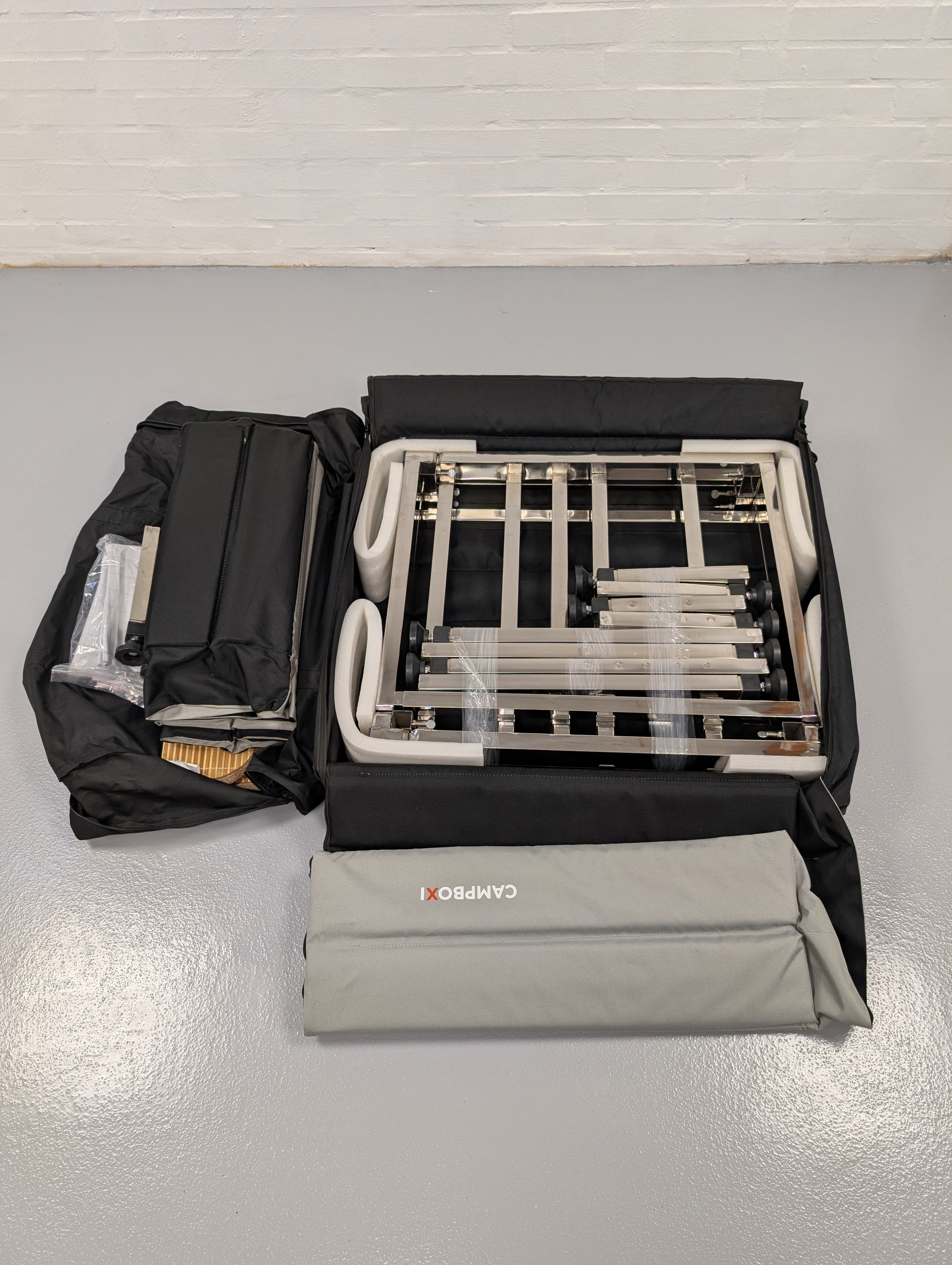 CampBoxi Unifit - Flexible and adjustable bed frame for your everyday car