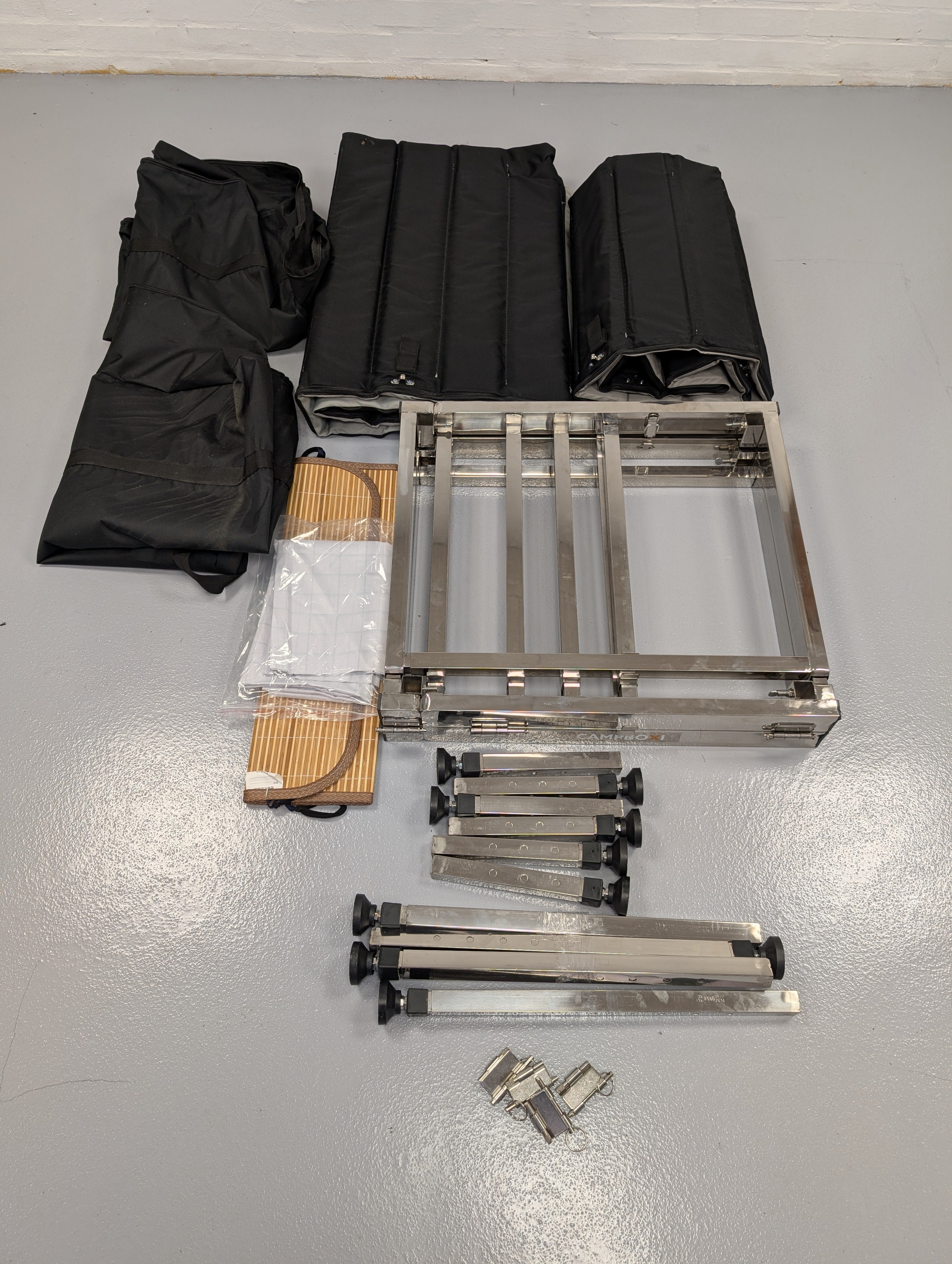 CampBoxi Unifit - Flexible and adjustable bed frame for your everyday car