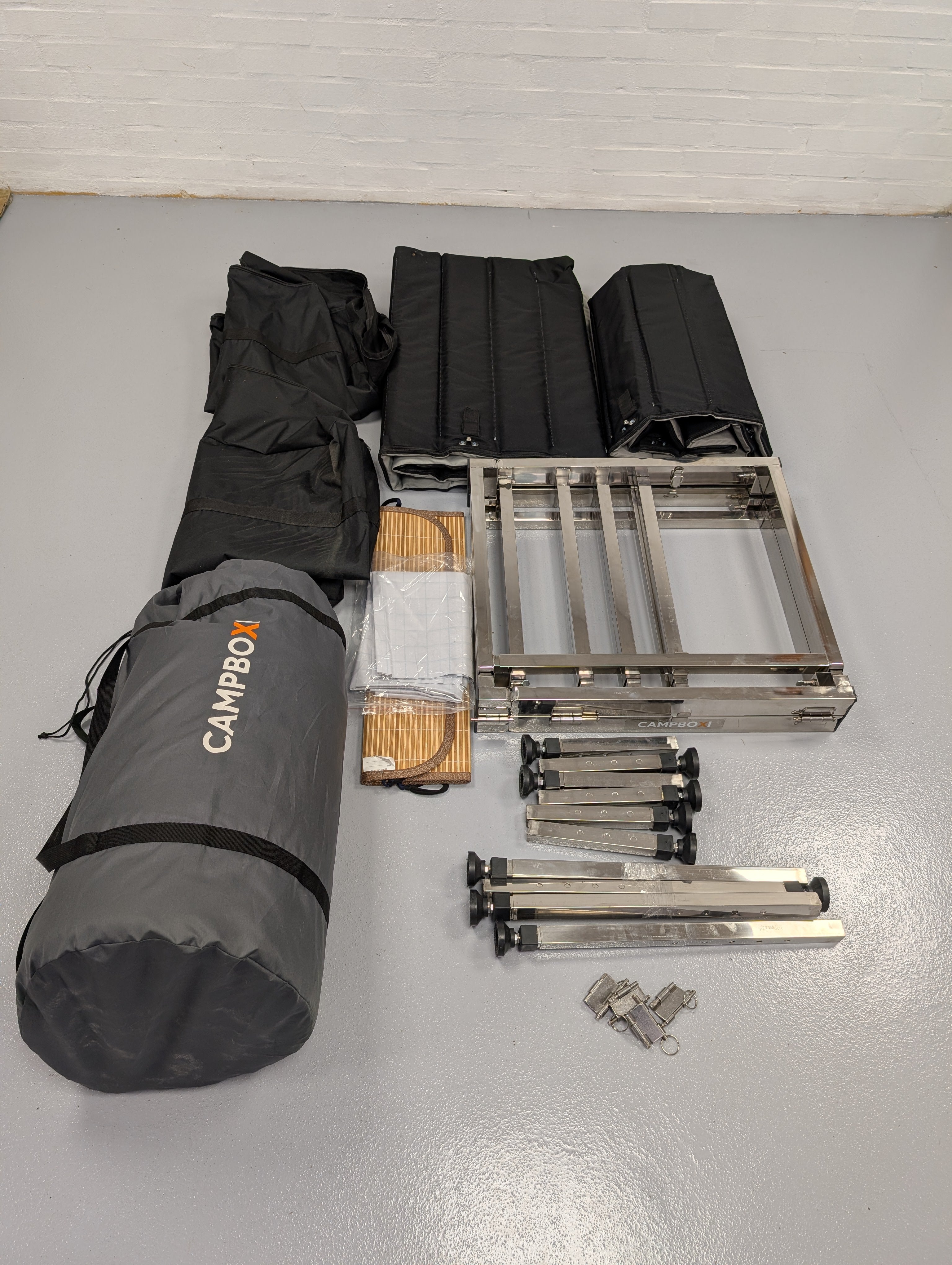 CampBoxi Unifit - Flexible and adjustable bed frame for your everyday car